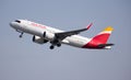 SPAIN, BARCELONA - AUGUST 8, 2023: Iberia Airbus A320 airplane takes off from Barcelona