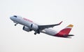 SPAIN, BARCELONA - AUGUST 8, 2023: Iberia Airbus A320 airplane takes off from Barcelona