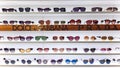 Display of sunglasses with multicolored glasses