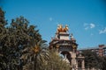 Spain, Barcelona - May 30 2022: A monumental two-level fountain in a classical style with an arch and a statue of Venus in the