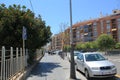 Neighbourhood, road, city, tree, car, lane, residential, area, plant, street, reflection, water, downtown, building, sky, vehicle,