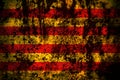 Spain, Catalonia, Senyera flag on grunge metal background texture with scratches and cracks