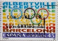 SPAIN - CIRCA 1992: A postage stamp printed in Spain shows the Olympic rings and the text Albertville as well as Barcelona 1992