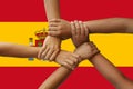 Spain flag, intergration of a multicultural group of young people Royalty Free Stock Photo