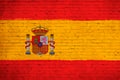 Spain flag painted on brick wall. National country flag background photo