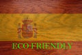 Spain flag on wooden background for global eco friendly environment, ecological and environmental saving and go green country