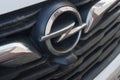 2022.Spain.Front of a car of the Opel automobile brand with the logo of the brand next to the front radiator Royalty Free Stock Photo