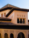 Spain, Granada, Alhambra, ,multi level mix of architectural design, elaborate Islamic carvings and plain walls in upper levels