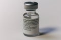 Spain - January 20, 2021 Close up picture of an empty phial of Pfizer COVID 19 vaccine. Selective focus