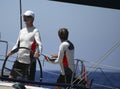 Spain king felipe steers aifos yacht during regatta