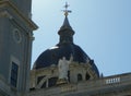 Spain, Madrid, Armory Square (Plaza de la Armeria), Catedral de la Almudena, angel statue and cathedral dome