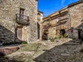 Scaffolding near the wall of a building in the mediaeval walled village Montfalco Royalty Free Stock Photo