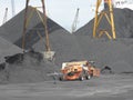 Spain: mountains of charcoal at Tarragona's harbour