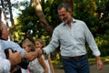 Spanish King Felipe cheers the photographers before posing in Marivent palace gardens Royalty Free Stock Photo