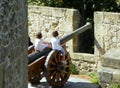 Spain, San Sebastian, Mount Urgull, Mota Castle, two children on an old cannon