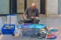 Spain, Seville, May, 3, 2017. Airbrush painter painting a beautiful abstract picture on the street during the Seville Fair