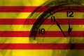 Spain, Spanish, Catalonia, Senyera flag with clock close to midnight in the background. Happy New Year concept