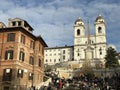 The Spain stairs in Rome and the church Trinita dei Monti at its top Royalty Free Stock Photo