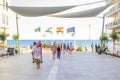 Spain summer holidays. Ancient town of Rota. People walking along the promenade. Royalty Free Stock Photo