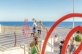 Spain summer holidays. People walking along the promenade. Rota, Cadiz, Spain Royalty Free Stock Photo