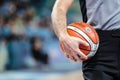 Basketball referee with official orange ball Royalty Free Stock Photo