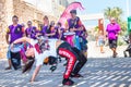 SPAIN-TORREVIEJA, ALICANTE - JUNE 16, 2018 oung Cheerful People Drum Percussion Clapping Woman Girl Demonstrates Capoeira