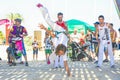 SPAIN-TORREVIEJA, ALICANTE, ROCK AGAINST CANCER - JUNE 16, 2018: Group of Young People Drum Percussion Woman Demonstrates Capoeira