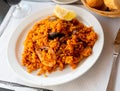 Spainsh dish seafood paella with rice, shrimps and mussels Royalty Free Stock Photo