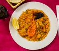 Spainsh dish seafood paella with rice, shrimps and mussels Royalty Free Stock Photo
