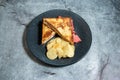 Spam Sandwich with chips and mayo dip sauce served in plate isolated on background top view of breakfast food indian spices Royalty Free Stock Photo