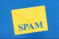 SPAM warning message on white envelope on blue