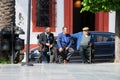 Three Spanish men on a bench,. Carmona, Spain.