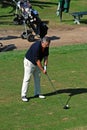 Golfer at the Rio Real Golf Club, Marbella, Spain.