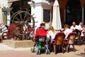 Tourists at pavement cafe, Nerja, Spain.