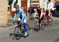 Cyclists in street, Orgiva, Spain. Royalty Free Stock Photo