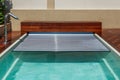 Span for pool. Rolling coating. Pool protection. Rollete. Security. Pure water. Pool protection system Royalty Free Stock Photo