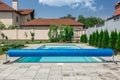 Span for pool. Rolling coating. Pool protection. Rollete. Security. Pure water. Pool protection system Royalty Free Stock Photo