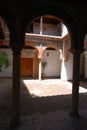 Courtyard with pretty balconies in the Mondragon Palace garden, Ronda, Spain.