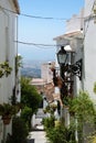 Steep narrow side street in the old town, Mijas, Spain.