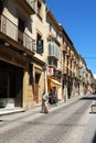 View along a traditional old town shopping street, Ubeda, Spain.