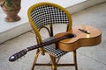 Spanish acoustic guitar on chair