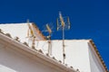 Spanish architecture, white roofs with antennas Royalty Free Stock Photo