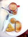 Spanish breakfast. Coffe with milk, bread with tomatoe and spanish omelette.