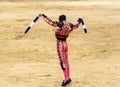 Spanish bullfight. The enraged bull attacks the bullfighter. Spain 2017 07.25.2017. Vinaros Monumental Corrida de toros. Royalty Free Stock Photo