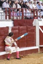 Spanish bullfighter Juan Jose Padilla sitting in the burladero with two flags in the right hand, as in the past is to, in the last