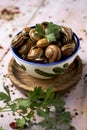 Spanish caracoles en salsa, cooked snails in sauce Royalty Free Stock Photo