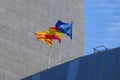 Spanish, Catalan and European flags waving Royalty Free Stock Photo