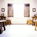 Spanish Colonial Room With Low Window and Wooden S Royalty Free Stock Photo