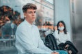 Spanish couple wearing facemask at a bus station Royalty Free Stock Photo