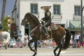 Spanish cowboy on horseback during opening day parade down State Street, Santa Barbara, CA, Old Spanish Days Fiesta, August 3-7 Royalty Free Stock Photo